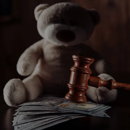 A teddy bear and a court gavel
