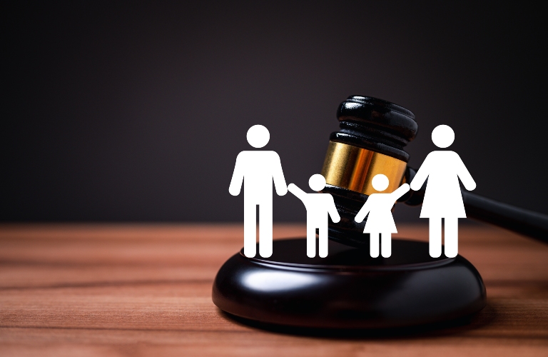 family figures and judge gavel